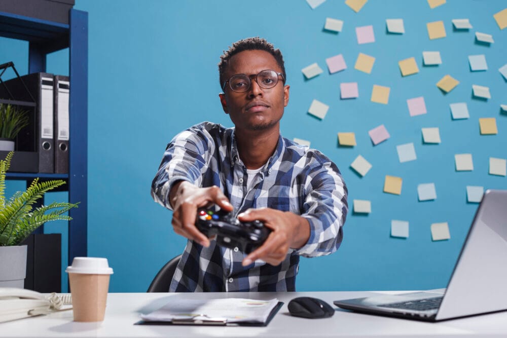 a man holding a video game controller